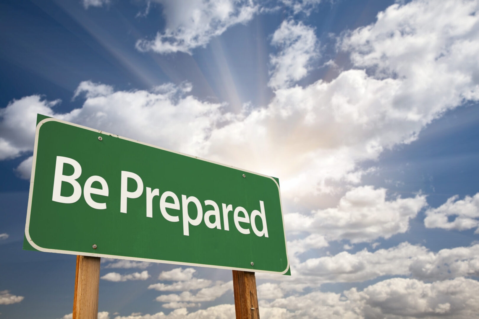 Be,Prepared,Green,Road,Sign,With,Dramatic,Clouds,And,Sky.